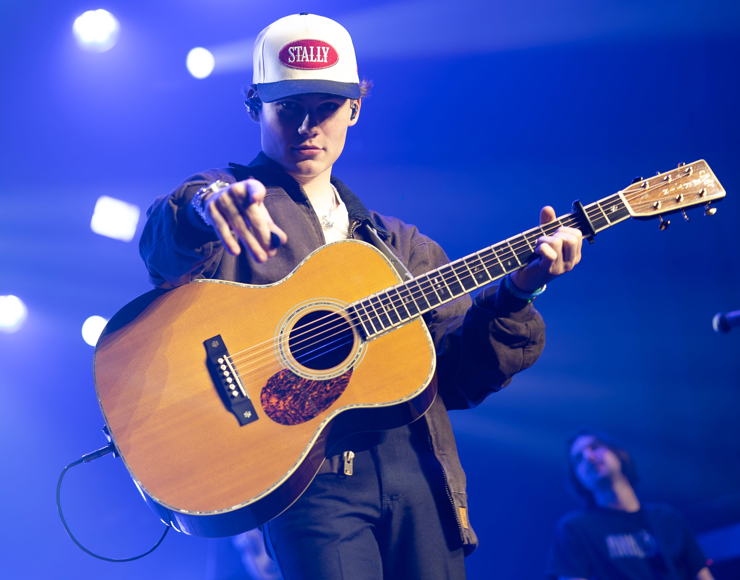 Maddox Batson performing live on guitar
